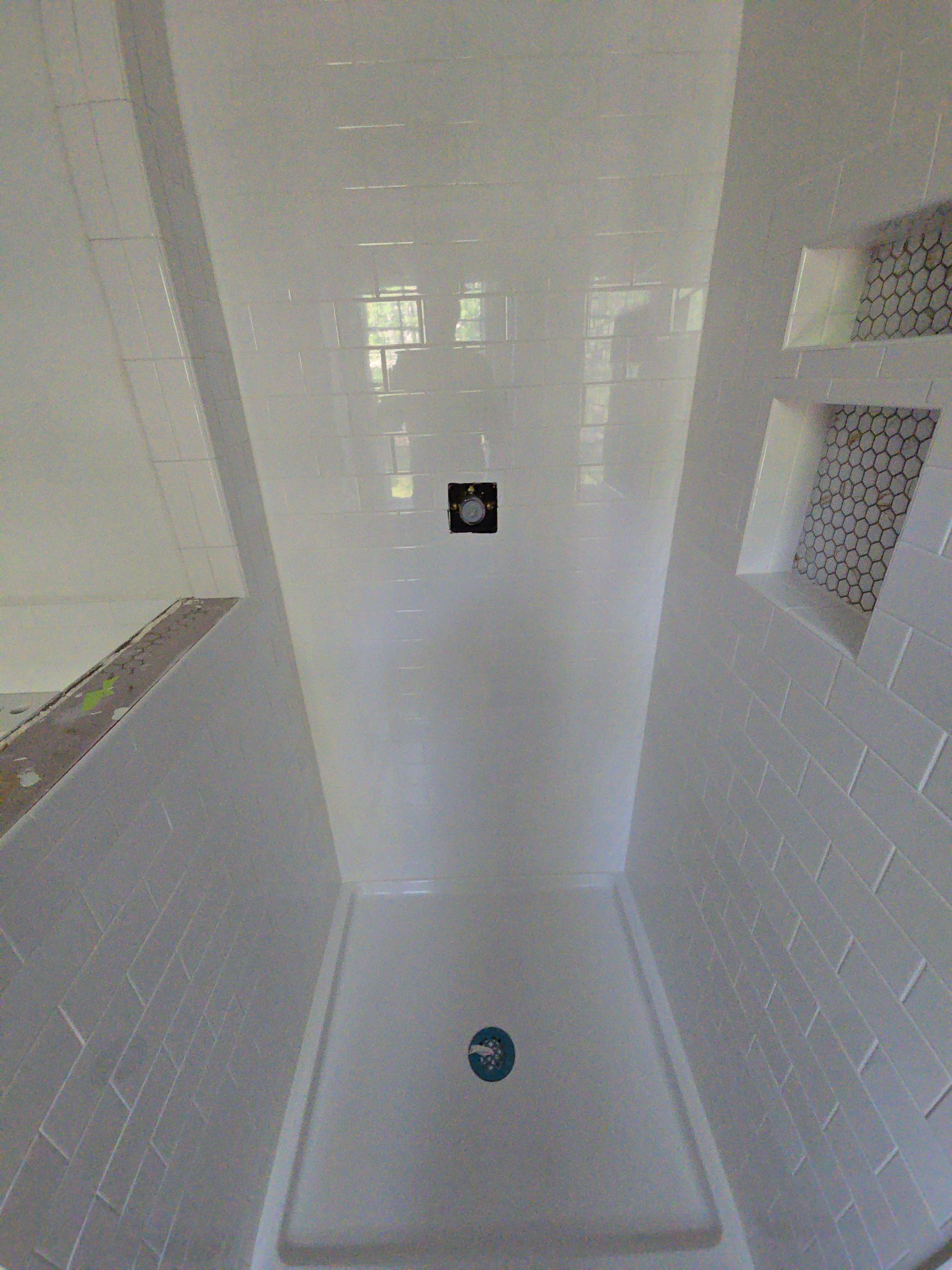 Completed shower tile installation